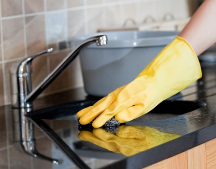 Carpet cleaning team preparing safely with protective equipment