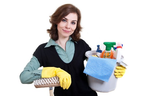 Professional carpet cleaner managing a safe work area