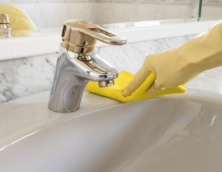 Thorough oven cleaning process in a modern Knightsbridge apartment kitchen
